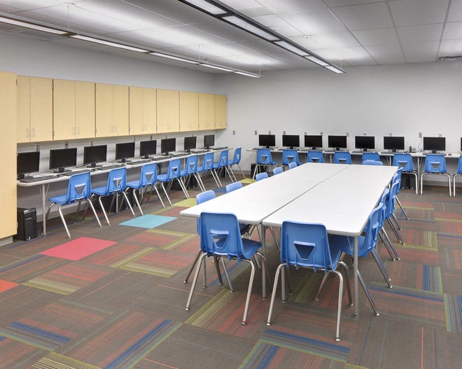 A computer lab at Holmes Park Elementary in Sapulpa doubles as a safe room. The school was designed by LWPB Architecture in Oklahoma City. Lisa Chronister, an architect and principal at the firm, said a computer lab makes sense as a safe room because windows aren¬¨aat needed and students are only in there occasionally, not all day. Photo Provided by Shreve Photography   ORG XMIT: 1305232220373044