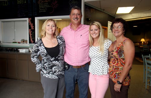 From left, Angela and Pastor Joe Greene, their daughter Krista Beaver and manager Shanna Hoyle are a part of Global Ministries Church, which has The Perk coffee shop at 1157-1 East Marion Street in Shelby. 
Brittany Randolph/The Star
