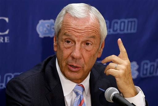 North Carolina coach Roy Williams answers questions during the team's NCAA college basketball media day in Chapel Hill, N.C., Thursday, Sept. 26, 2013. (AP Photo/Gerry Broome)