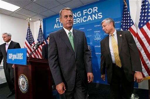 ASSOCIATED PRESS FILE PHOTO / House Speaker John Boehner, R-Ohio, center, and GOP leaders finish a news conference on Capitol Hill in Washington on Thursday, Sept. 26, 2013, after a closed-door strategy session. At right is House Energy and Commerce Committee Chairman Rep. Fred Upton, R-Mich., and at left is House Majority Whip Kevin McCarthy of California. Pressure is building on fractious Republicans over legislation to prevent a partial government shutdown, as the Democratic-led Senate is expected to strip a tea party-backed plan to defund the Affordable Care Act, popularly known as "Obamacare," from their bill.