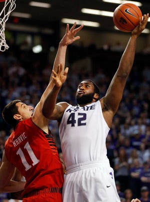 Kansas State forward Thomas Gipson, right, is the top returning big man for the Kansas State basketball team and has a sleek look after losing 25 pounds over the offseason.