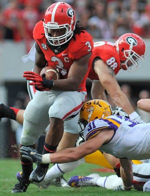 Georgia running back Todd Gurley (3) looks for a hole as Georgia takes on LSU at Sanford Stadium on Saturday, Sept. 28, 2013, in Athens, Ga.  (Richard Hamm/Staff) OnlineAthens / Athens Banner-Herald