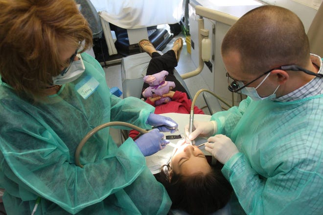 Patients receive free dental care at a clinic hosted by the N.C. Baptist Men at Zoar Baptist Church in Shelby in 2012. (Star file photo)