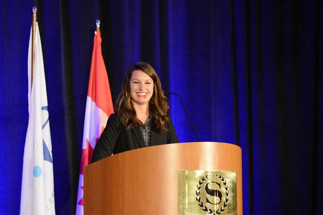 Lindsay Pierce presents her plan to begin the first collegiate chapter of Executive Women International at the group’s 2013 Leadership Conference and Annual Meeting earlier this month in San Diego, Calif.
