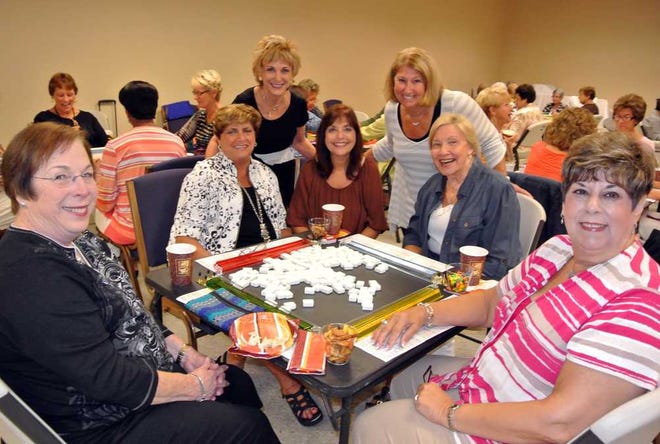 Jackie Rooney for Shorelines TOP: Nancy Rubin (from left), Alice Goldman, event chairwoman Donna Berger, Leslie Kleiman, Beth El Sisterhood president Helen Siegal, Patsy Fittipaldi and Lois Lazarus played mah jongg at the third annual Game Day for Beth El synagogue. CENTER: Debbie Young (from left), audiologist Jane Burns, Sheryl Roussin, Lend An Ear President Lisa Sheek, Nancy Gabrinszeski and Pauline Collings helped produce the second annual Hear By The Sea event to raise money for hearing aids for deaf seniors and children. The event was at Casa Marina at Jacksonville Beach. BOTTOM: Lisa Long (front from left), Fr. William Kelly, Mary Jane Brown and Jeanie Bankert, and Kathy Rhodes (from left back) Anne Dixon, Shannon Burbridge, Nadine Rubin, Annette Wallander and Marianne Rizzo were Core Team members who helped organize HomeBound, the first major fundraiser for Beaches Community Kitchen held at The Outpost in Ponte Vedra.