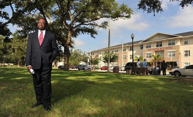 Bruce.Lipsky@jacksonville.com Ronnie Ferguson, standing under the oak canopy Friday at Brentwood Lakes in Jacksonville, has retired as president and CEO of the Jacksonville Housing Authority.