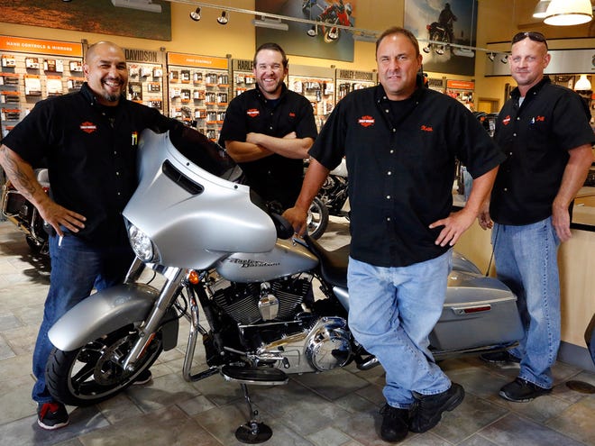 From left, Jasper Roe, Ellis Boswell, Keith Gillingham and Jeff Turner show off the new line of Harley-Davidsons, also known as Project RUSHMORE.