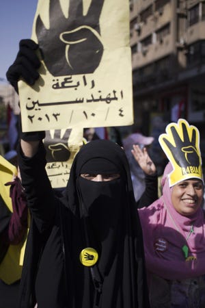 A supporter of Mohammed Morsi is part of a Cairo protest of the president's ouster.