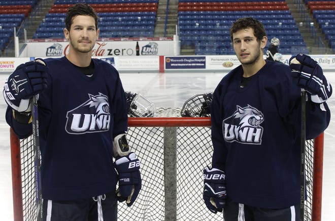 The UNH hockey team expects big things this season from forwards Grayson Downing, left, and Kevin Goumas.