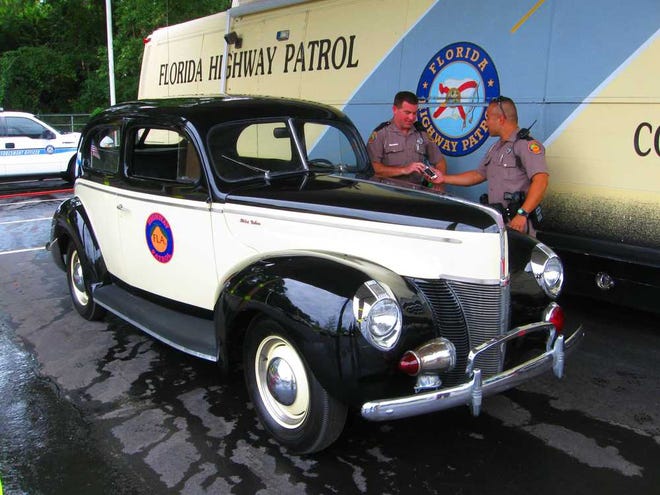 Florida Highway Patrol troopers snapped some photos of the Jacksonville barrack's restored 1940 Ford DeLuxe police cruiser before an outing. The car is one of the agency's originals and is used for promotions and educational outings.