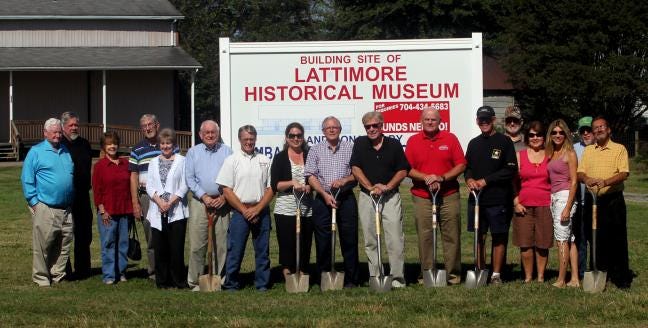 Brittany Randolph / The Star
A group gathers for a groundbreaking at the future site of the Lattimore Historical Museum on Wednesday.
