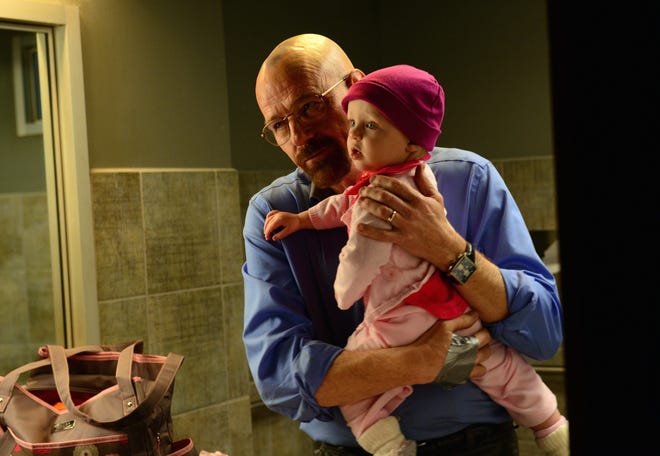 This image released by AMC shows Walter White, played by Bryan Cranston, after he abducted his daughter Holly in a scene from the season five of "Breaking Bad." The Sept. 29, 2013 finale of Breaking Bad, generated a record 1.24 million tweets. People used the hashtag GoodbyeBreakingBad nearly 500,000 times on Twitter. (AP Photo/AMC, Ursula Coyote, File) ORG XMIT: CAPH608