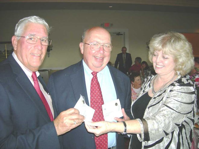 Bill Napper, left, and Marty Cohen accept their awards from Marie Joy, director of the 7th Judicial District Mediation Program. Contributed photo.