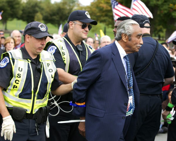 U.S. Rep. Charles Rangel, D-N.Y., is arrested on Capitol Hill during an immigration rally.