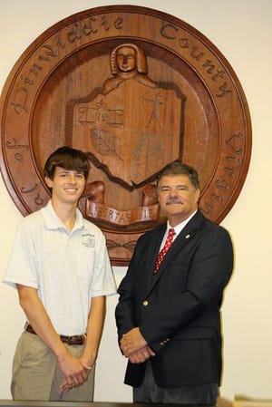 CONTRIBUTED PHOTO
From left, Logan Harrison, Dinwiddie County High School senior and 2013 Boys' State participant, stands with Dr. Mark Moore, chairman of the Dinwiddie County Board of Supervisors and 1978 Boys' State participant. The two recently talked about their experiences with the program.