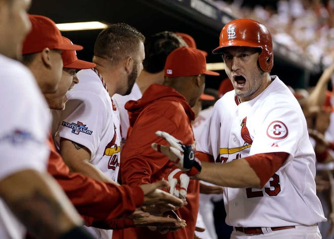 St. Louis' David Freese, right, hit a two-run home run against Pittsburgh in the second inning of Game 5 of the NLDS on Wednesday to put the Cardinals up 2-0.