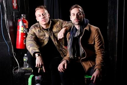 Ben Haggerty, better known by his stage name Macklemore, left, and his producer Ryan Lewis are up for six AMA awards, including artist, new artist and single of the year.