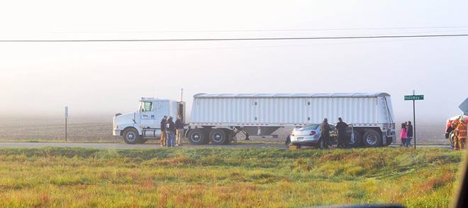 Police investigate a crash Thursday morning on Holloway Road at Ridge Highway between a car and a tractor-trailer. The driver was taken to ProMedica Toledo Hospital for treatment of unspecified injuries.