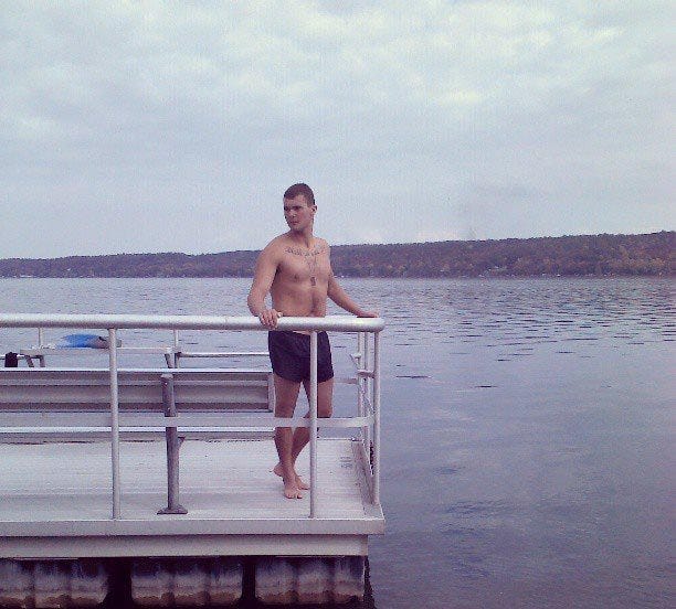 Oliver Love stands in Woodville, where he finished after swimming the length of Canandaigua Lake in September. He is now serving as a Marine lance corporal in Okinawa, Japan.

SUBMITTED