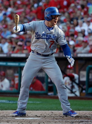 Los Angeles Dodgers' Nick Punto shouts after striking out during the third inning of Game 2 of the National League baseball championship series against the St. Louis Cardinals Saturday, Oct. 12, 2013, in St. Louis. (AP Photo/David J. Phillip)