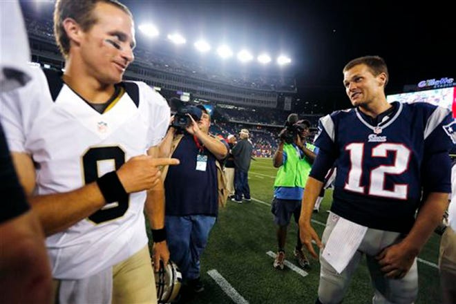 Saints quarterback Drew Brees, left, and Patriots quarterback Tom Brady greet one another after a 2012 exhibition game at Gillette Stadium.