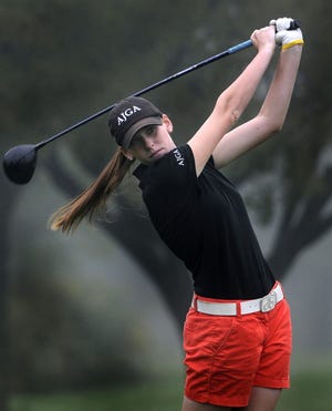 Jackie Rogowicz, Pennsbury, follows through on a drive at the SOL Girls Golf championships at Five Ponds Golf Course in Warminster on Wednesday. Art Gentile/Staff photographer