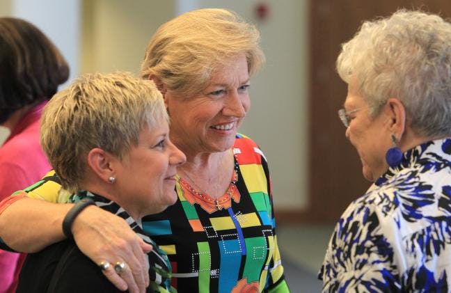 "A Tribute to Our Hometown Hero Sylvia Hatchell" was held earlier this year at the Gastonia Conference Center in downtown Gastonia and hundreds of people attended the event. Here, Sylvia Hatchell gives a hug to childhood friend Leigh Ann Fender in front of Leigh Ann's mom, Beverly Cloer.