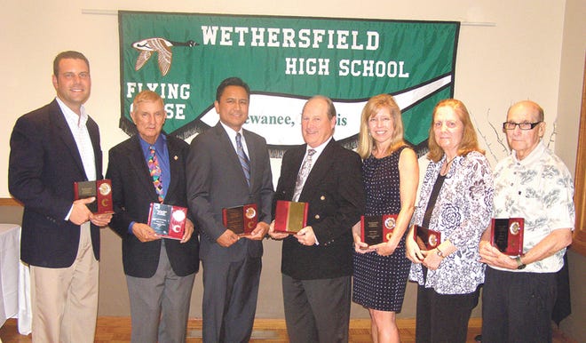 The Wethersfield Academic Hall of Fame induction ceremony was held Saturday night at The Kewanee Dunes. From left are Jason Craig, who represented his father, alumni inductee Dan Craig; Bill Hollein, who represented his son, alumni inductee John Hollein; alumni inductees Lito Lopez, Dana McReynolds and Diane Dungey; and staff inductees Jane and Jim Carney.