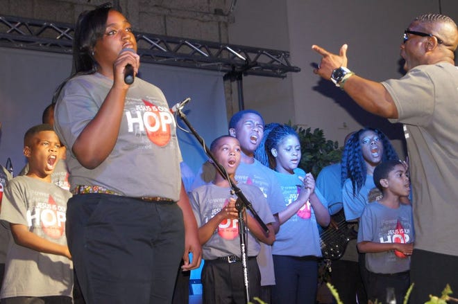 The Holmeville Missionary Baptist Church youth choir, of Folsom, was one of the featured talents at the “Gospel Night: A celebration of Gospel” event at the Lamar Dixon Expo Center Saturday night. Photo by DeRon Talley.