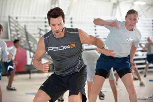 Fitness celebrity Tony Horton, creator of the P90X workout, leads about 90 airmen in a workout session Wednesday morning at Eglin Air Force Base.