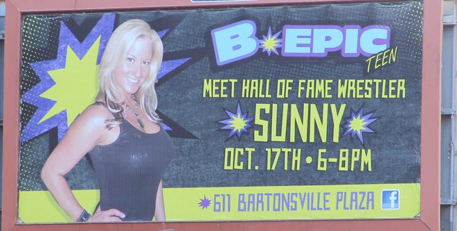 A billboard advertises the Oct. 17 appearance of wrestling personality Tammy “Sunny” Sytch at B Epic Teen Store in Stroudsburg. Sunny will be signing photographs to raise money for local resident, Penny Gass, as well as to promote a “Trick or Beat” pro wrestling benefit show to take place at Big Wheel in Stroud Township.