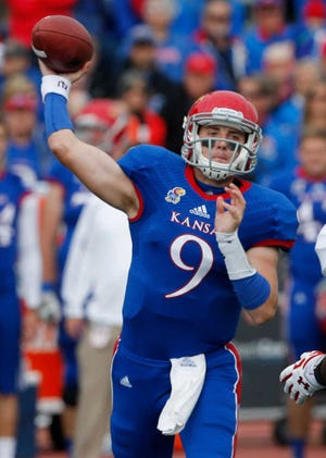 Kansas quarterback Jake Heaps struggled last week on the road at TCU.