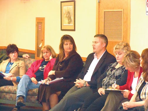 At the Wednesday evening Families Against Narcotics (FAN) meeting in Sault Ste. Marie, Cheboygan County Prosecuting Attorney Darrell Vizina (right of center) discussed how the drug court in his area operates.