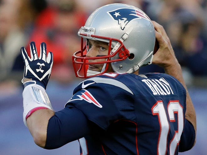 New England quarterback Tom Brady looks for a receiver in the first half of last Sunday’s game against New Orleans.