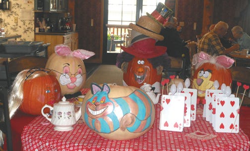 Freighter View Assisted Living has done their annual pumpkin decorating for several years and this year's theme was “Alice in Wonderland” and the tea party scene. Susan Michalski, the activities director, said the residents love the annual event.
