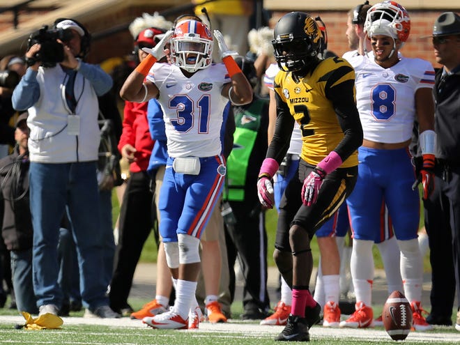 Florida defensive back Cody Riggs (31) is penalized for targeting and ejected on the game’s first offensive play during the Gators’ 36-17 loss to Missouri at Faurot Field in Columbia, Mo. on Saturday.