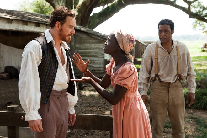 AP photo

This image released by Fox Searchlight shows Michael Fassbender, left, Lupita Nyong'o and Chiwetel Ejofor, right, in a scene from "12 Years A Slave."