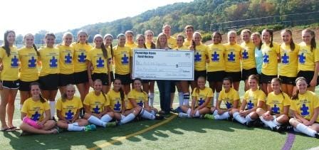 Pennridge field hockey players raised $600 for Autism Speaks.