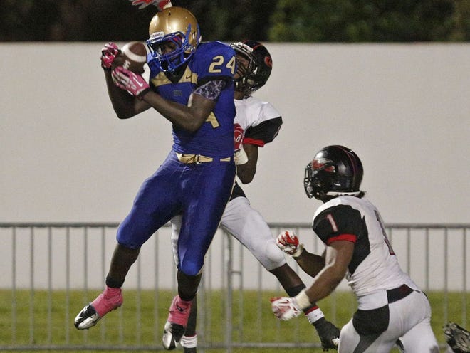 D.J. Copeland and Mainland held off New Smyrna Beach 14-13 in overtime.