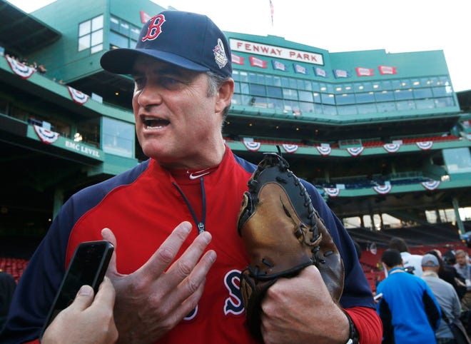 Red Sox manager John Farrell speaks with reporters Monday at Fenway Park as the team gets ready to face the Cardinals in the World Series starting Wednesday night.