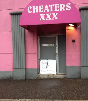 A sign posted on the door to the main entrance of Cheaters Gentlemens Club Friday reads "Closed till further notice. Under renovations."