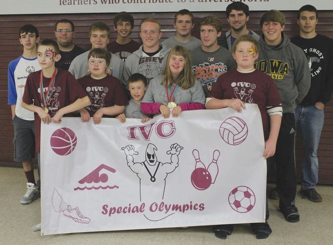 Players from the Special Olympics and wrestling team lined up at Meet us on the Mat Saturday. The event was to raise funds for both teams to purchase new equipment and uniforms.