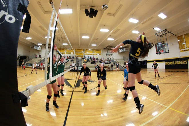 Kings Mountain's Kayla Bolt goes up for a kill that clinched the Game 1 win in Tuesday's 3-0 victory against A.C. Reynolds in the second round of the 3A playoffs. The Mountaineers play at St. Stephens in Saturday's third round.