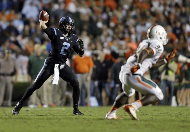 North Carolina quarterback Bryn Renner prepares to make a throw during last Thursday's 27-23 loss to Miami in Chapel Hill, N.C.  Gerry Broome Associated Press
