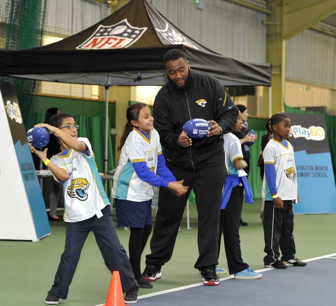 Sean Ryan NFL Jacksonville Jaguars player Will Rackley holds a football/cheerleader coaching clinic Tuesday with Oakington Manor Primary School in London. The Jags play the 49ers at Wembley Stadium on Sunday.
