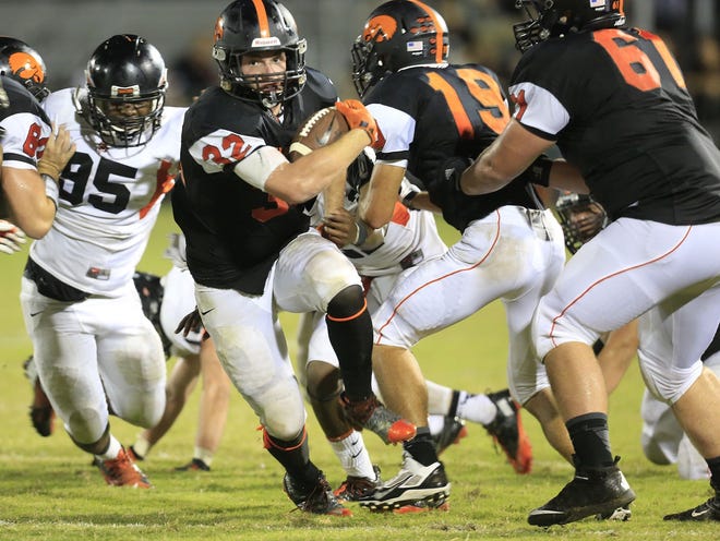 Spruce Creek’s Collin Olsen is averaging 5.1 yards per carry for the surprising Hawks.