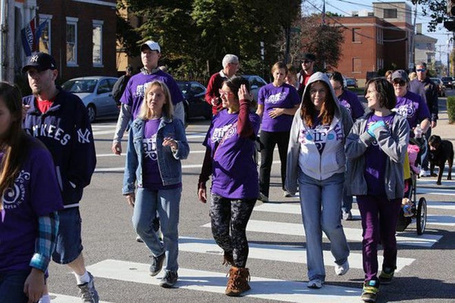 Participants walk through downtown Portsmouth.