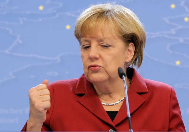 German Chancellor Angela Merkel addresses the media Friday at the European Council building in Brussels. European leaders united in anger Thursday as they attended a summit overshadowed by reports of widespread U.S. spying on its allies, allegations Merkel said had shattered trust in the Obama administration.