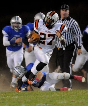 Pennsbury's Ronquay Smith (27) runs down the field during Friday night's football game against Bensalem High School.