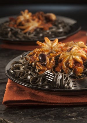 Foods with deep black hues set the stage for Halloween dinners: Black rice, squid ink pasta, blackberries.